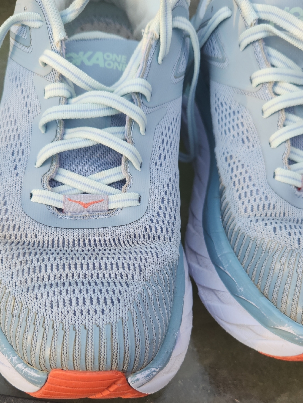 Hoka One One Women's Pale Blue Athletic Running Shoes with Orange Accents